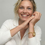 Ladies link bracelet with ball pendant in gold appearance