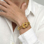 Women's bracelet with knot design and braided structure