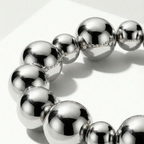 Ladies Elastic Ball Bracelet in Polished Silver Look