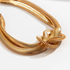 Women's bracelet with knot design and braided structure