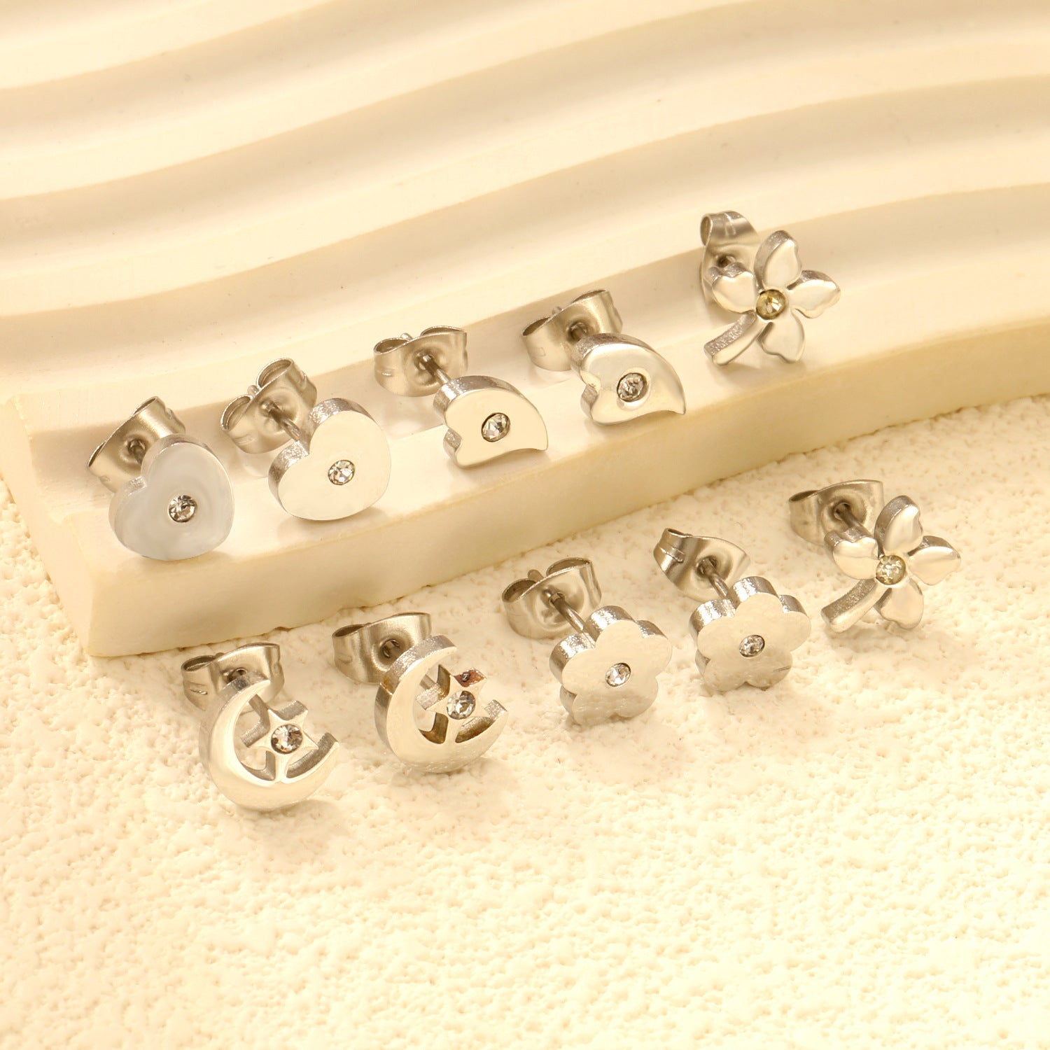 Women's stud earrings set made of hypoallergenic stainless steel with sparkling zirconia