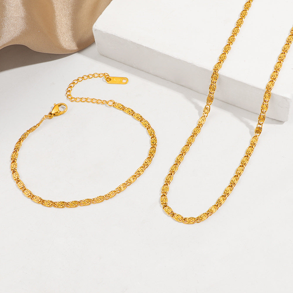 Women Textured Gold Necklace and Bracelet Set