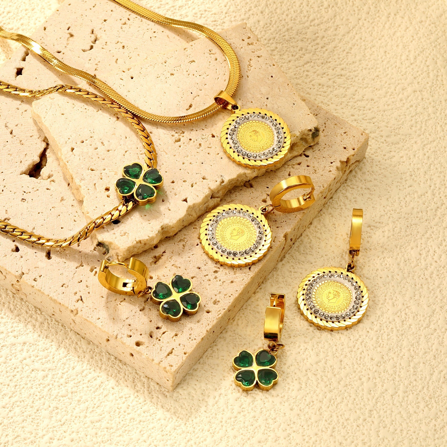 Women's jewelry set with four-leaf clover pendant and stud earrings