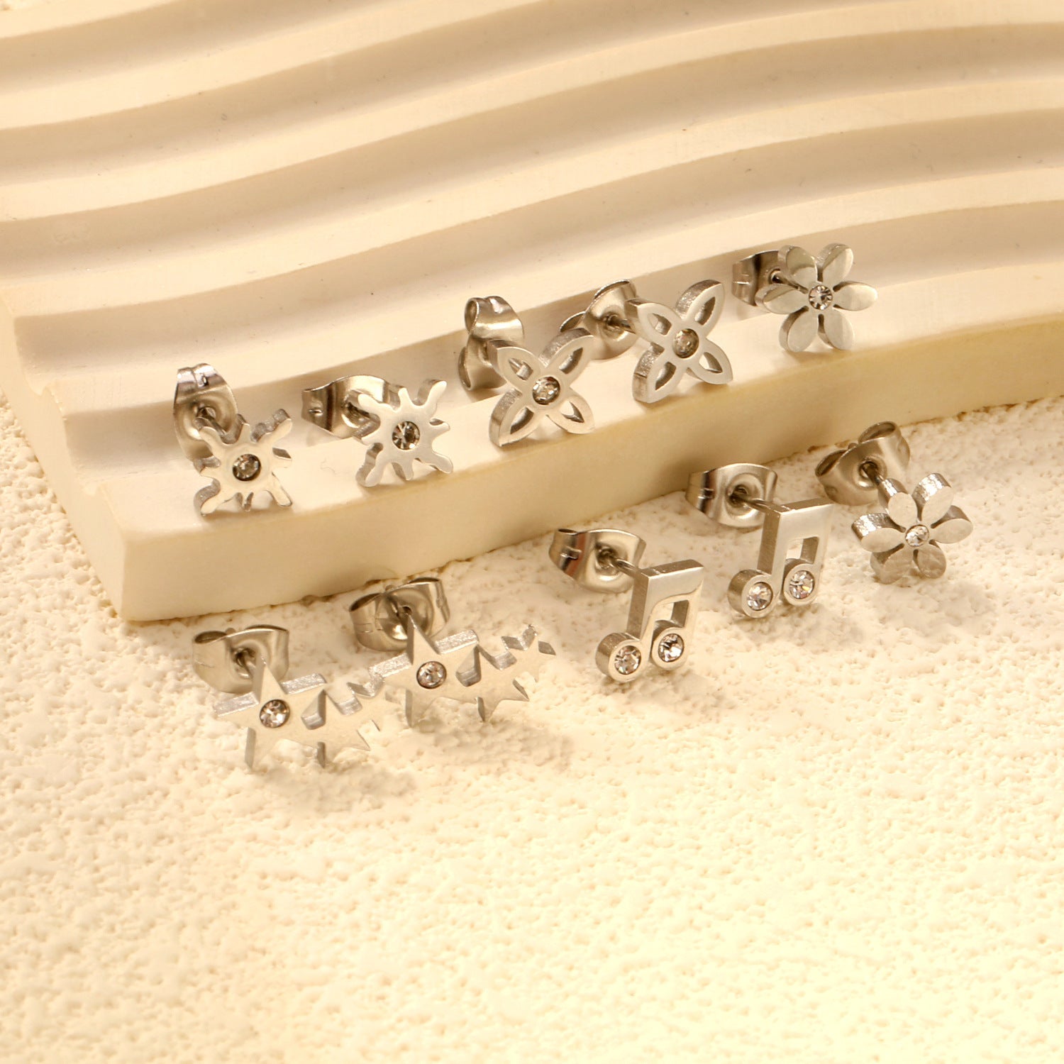 Women's stud earrings set made of hypoallergenic stainless steel with sparkling zirconia